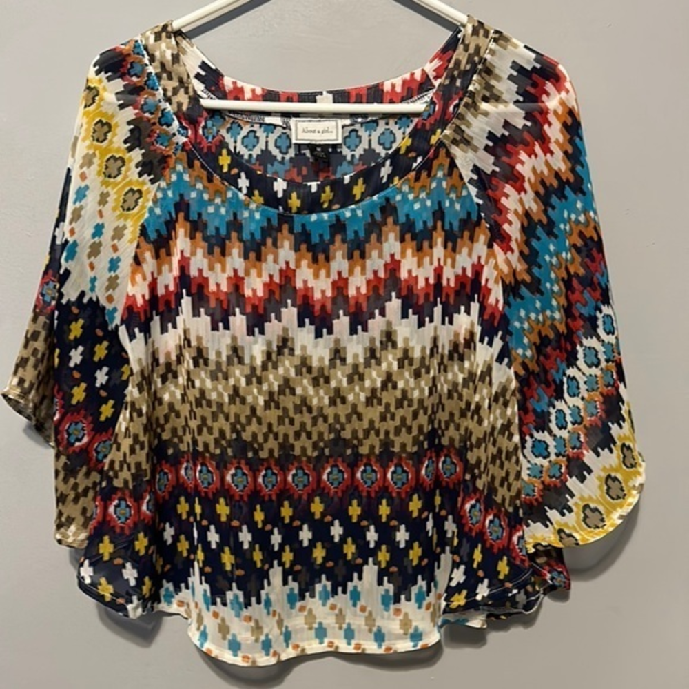 Ladies top about a girl…‎